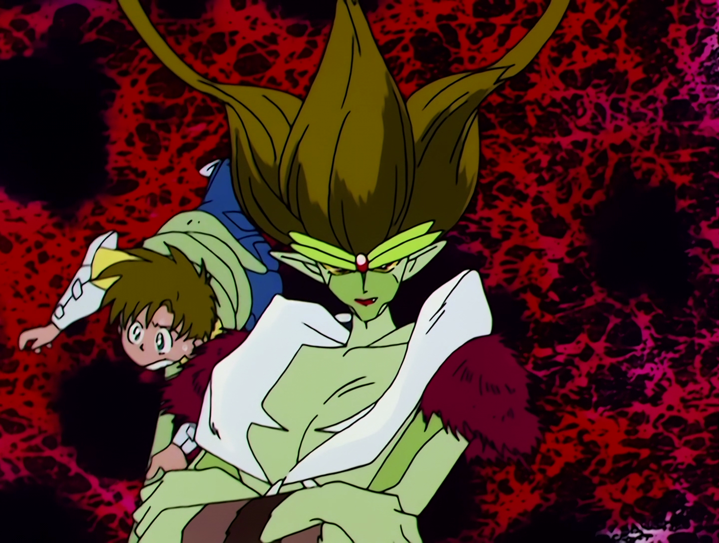 Hell Ant, a Cardian from Sailor Moon episode 50. She has green skin and brown petal-like protrusions on the top of her head, which have tentacles sprouting from them. She has Shingo held aloft behind her.
